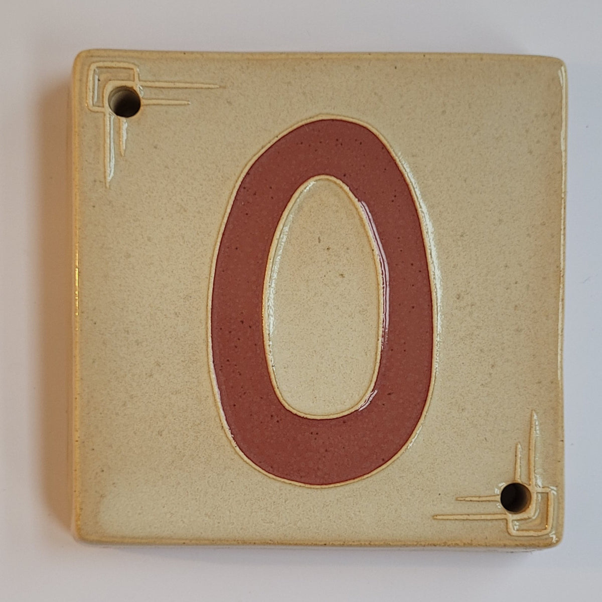 Craftsman ceramic address number tile 0 with corner line-work, handmade in Detroit